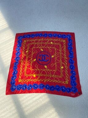 Red Silk Scarf with Bold Blue Floral and Gold Chain Motif